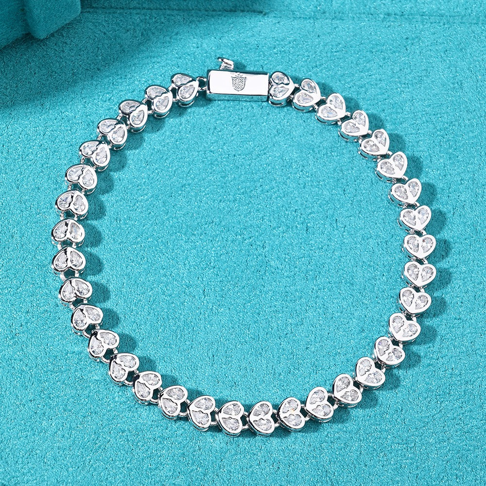Brazalete whitegold tennis hearts clasp 2025