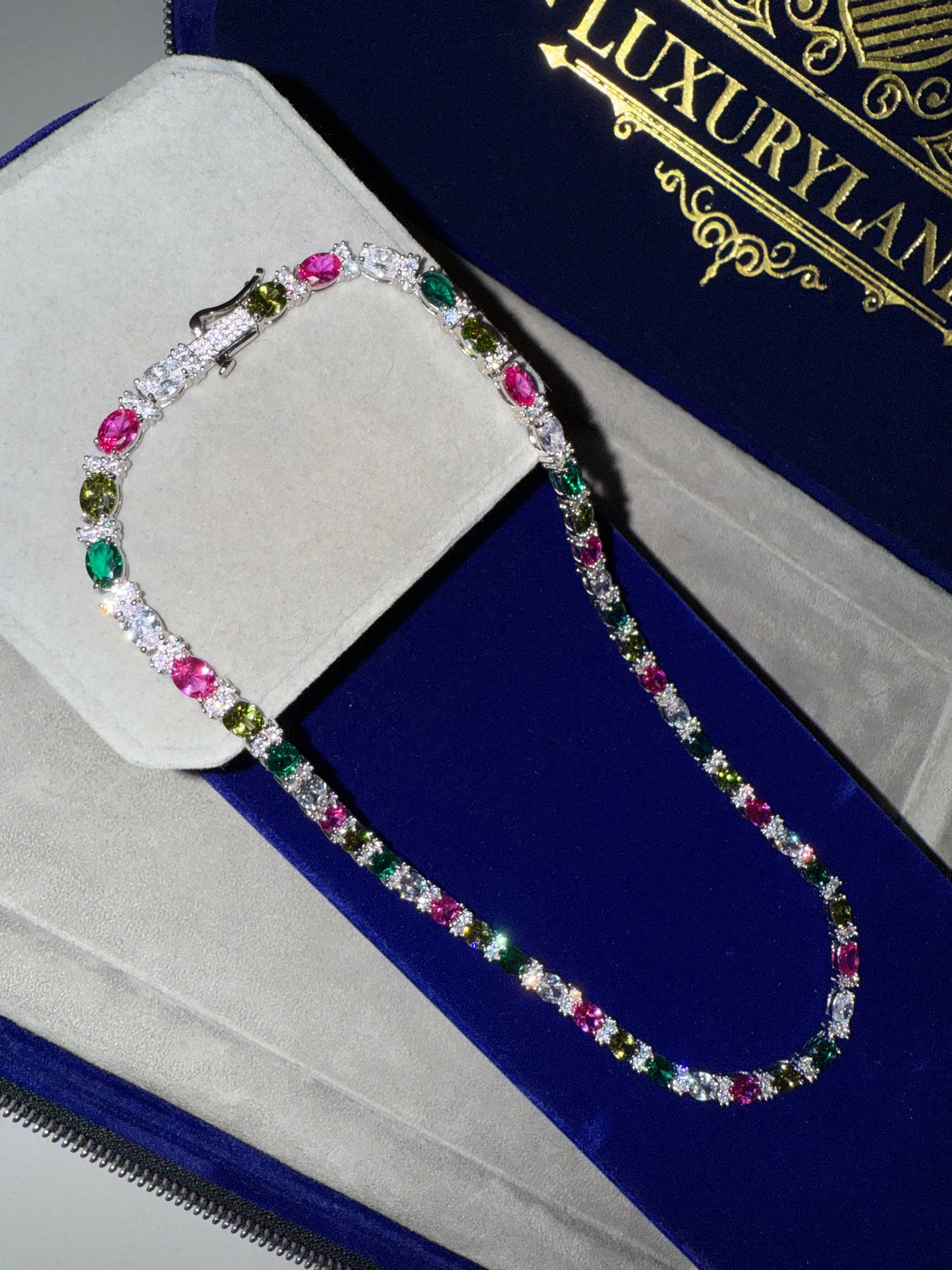 Tennis cadena multi-color y multi destellos whitegold plated 18 k