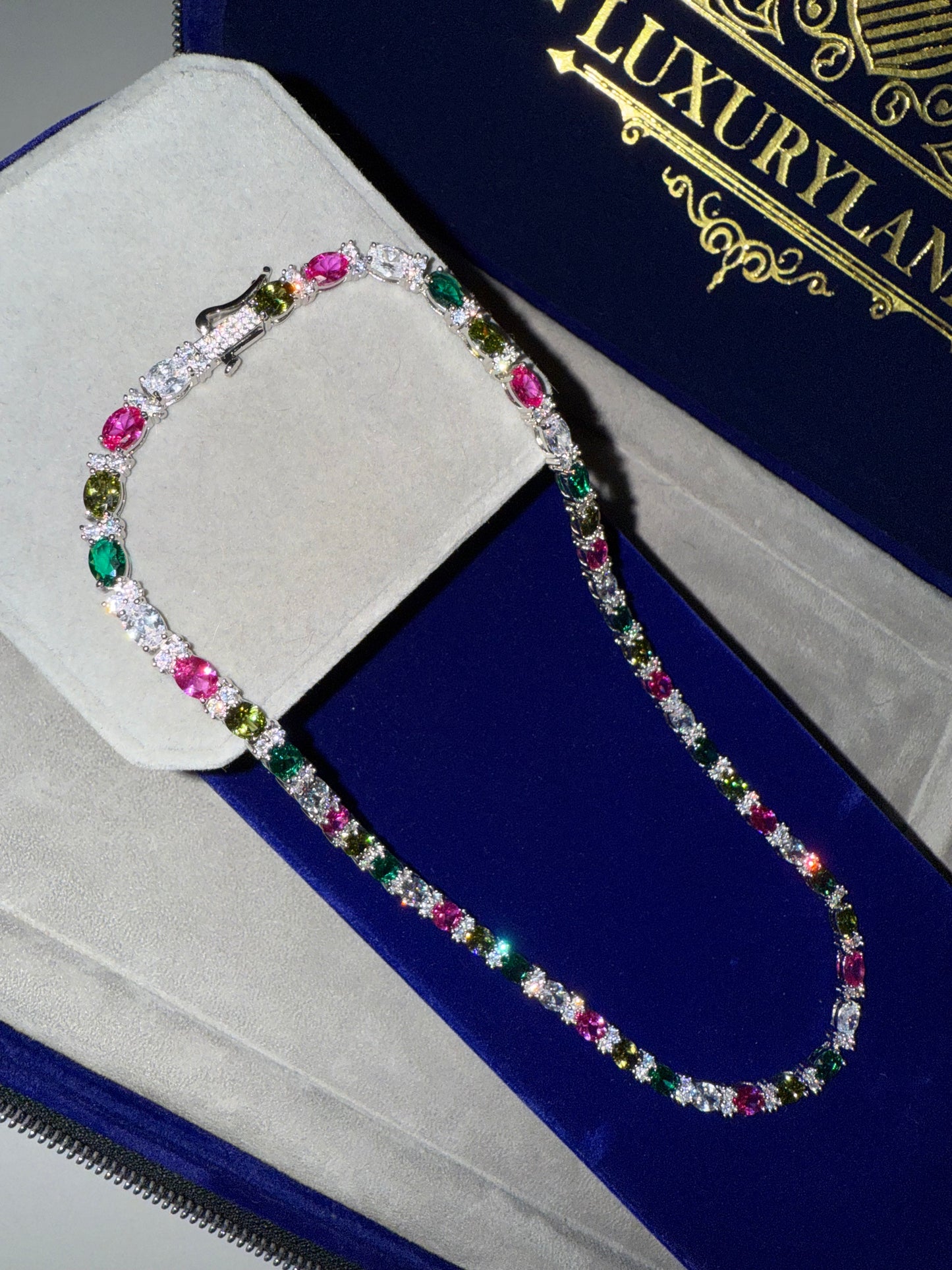 Tennis cadena multi-color y multi destellos whitegold plated 18 k