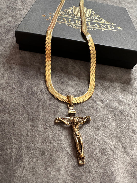 Dije de Cristo olímpico y cadena panza de serpiente Golden lamianado en 18k