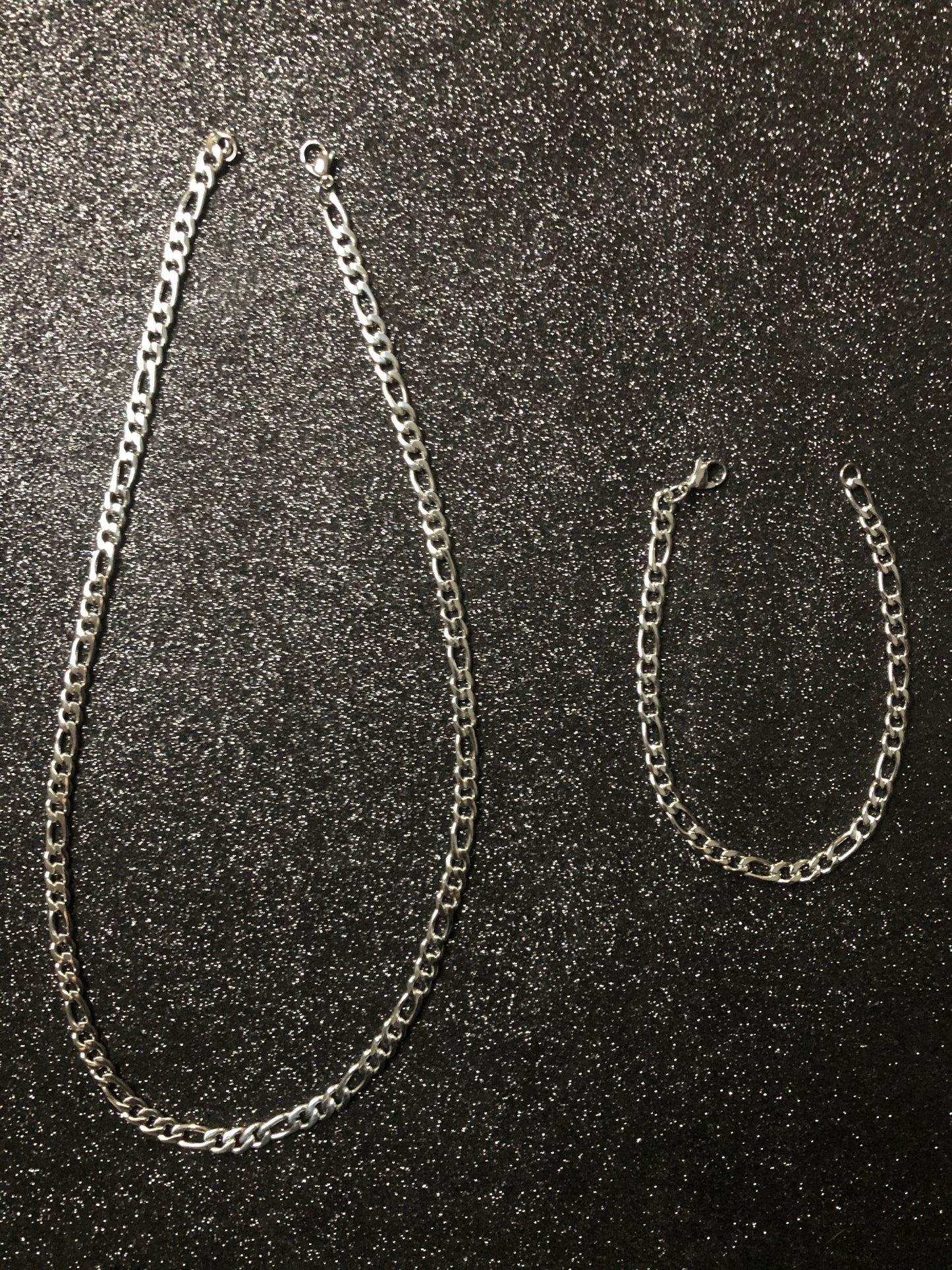 Conjunto cadena y pulso tejido CRTR, laminado 4 micras oro blanco de 18 kilates