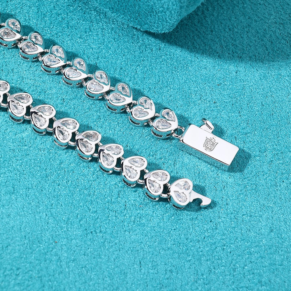 Brazalete whitegold tennis hearts clasp 2025