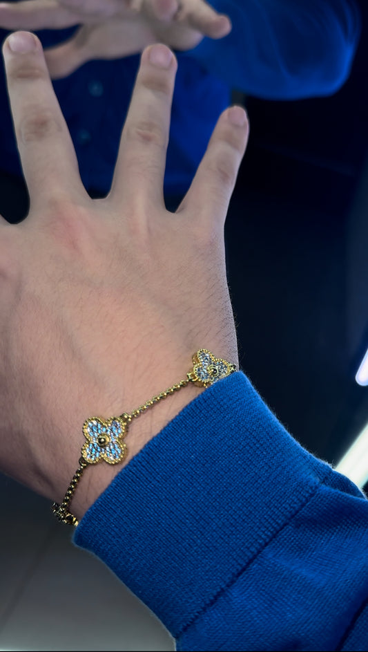 Brazalete vancleef gold and  blue  full iced