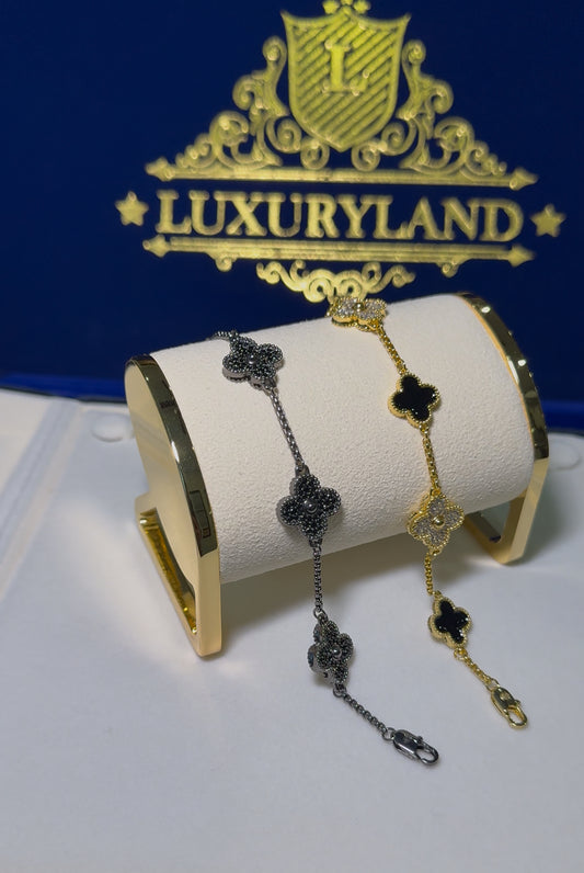 Combo de brazaletes VC. full black y brazalete VC golden x black