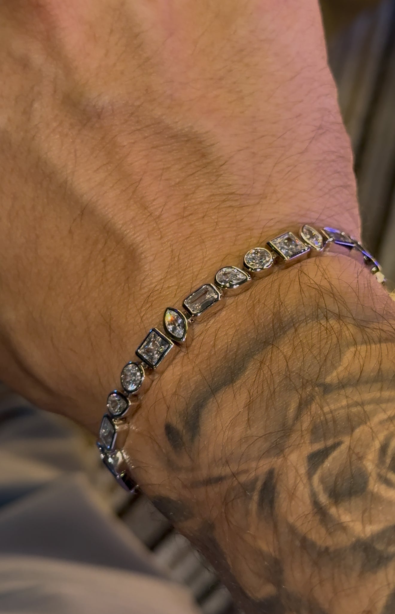 Irregular whitegold gems bracelet