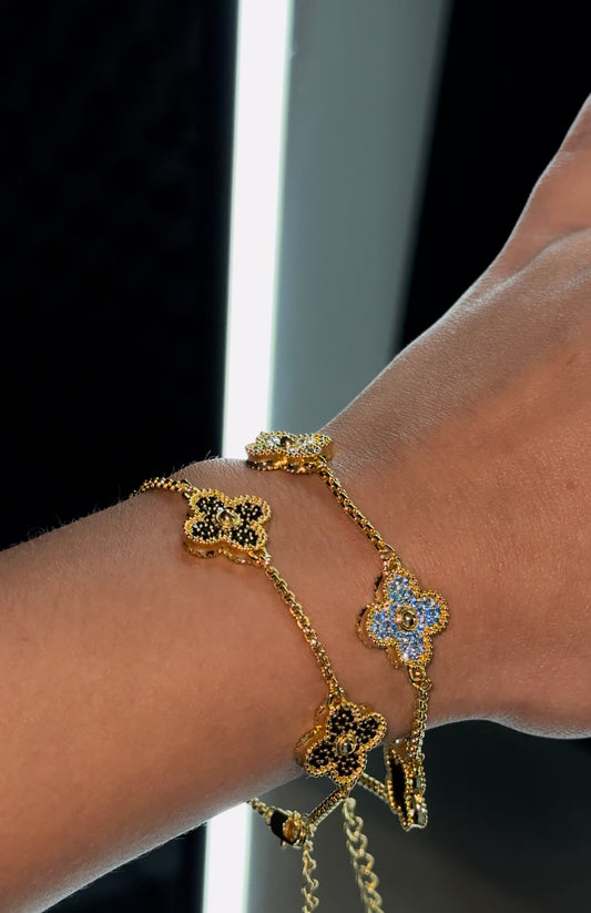Combo de brazaletes en promoción (brazaletes VC. golden x black + brazaletes VC. golden x blue)