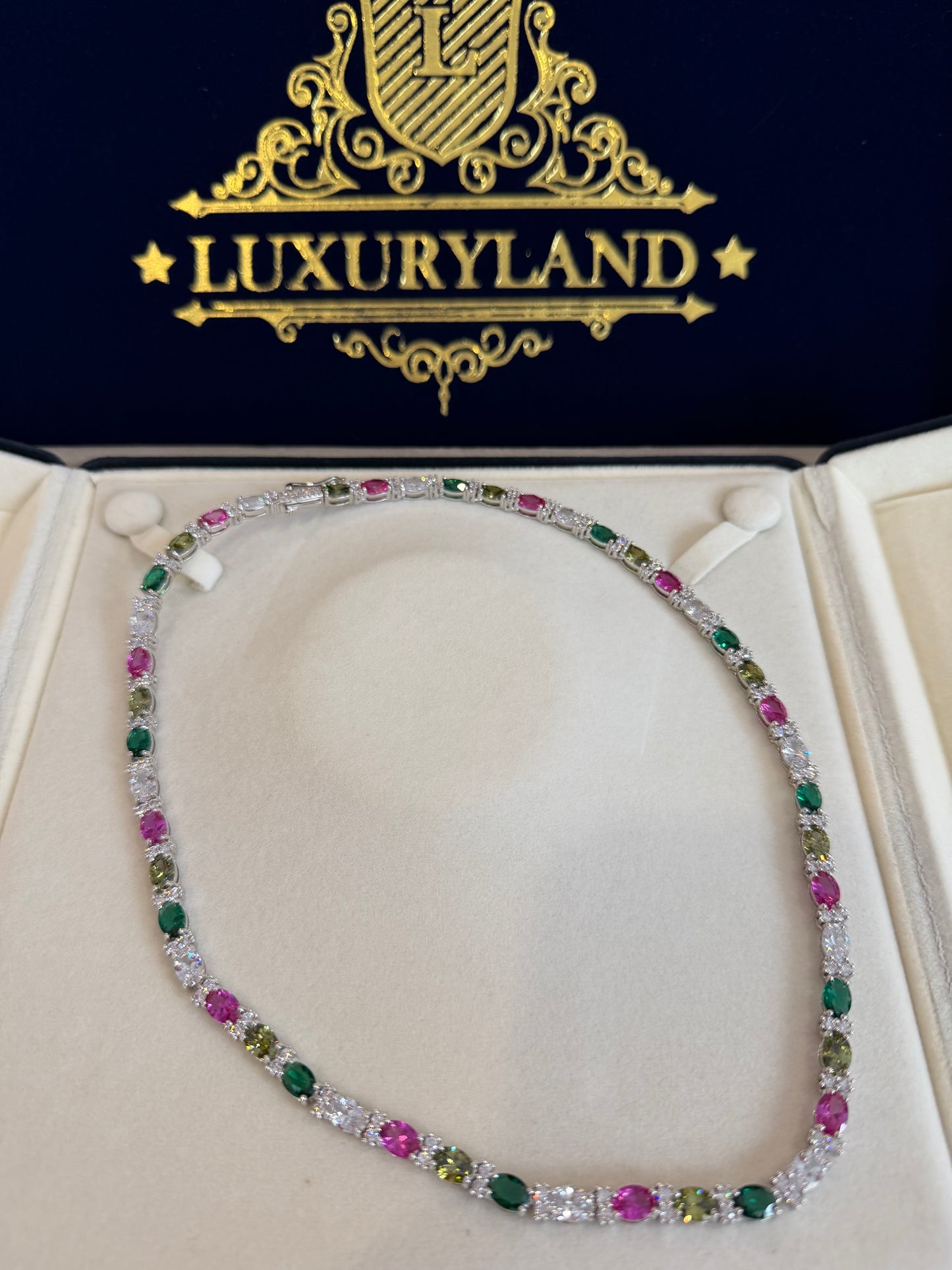 Tennis cadena multi-color y multi destellos whitegold plated 18 k