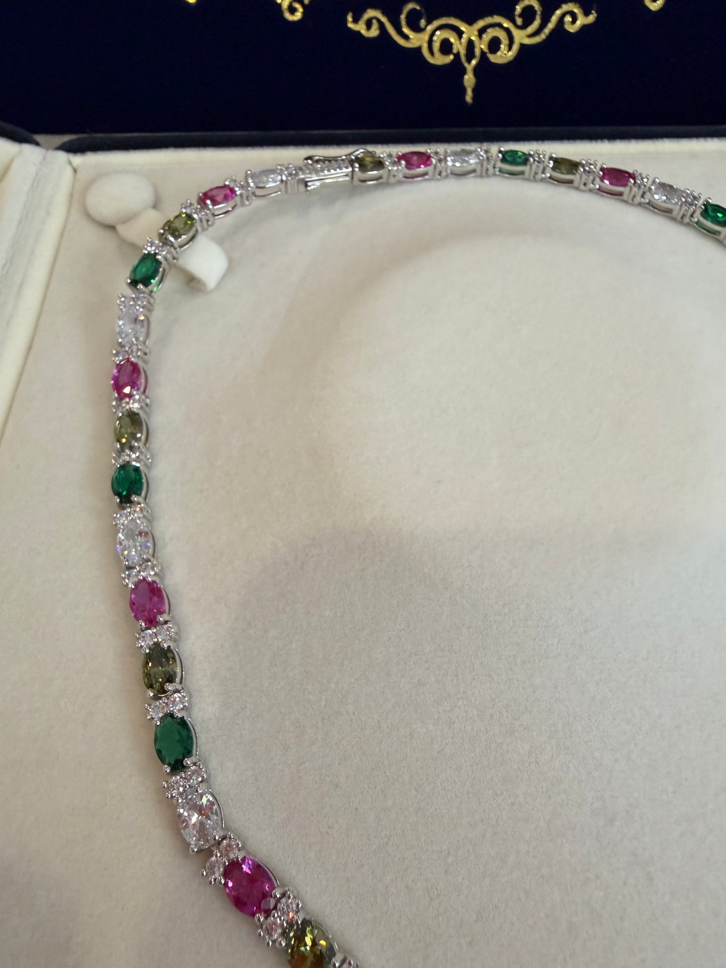Tennis cadena multi-color y multi destellos whitegold plated 18 k