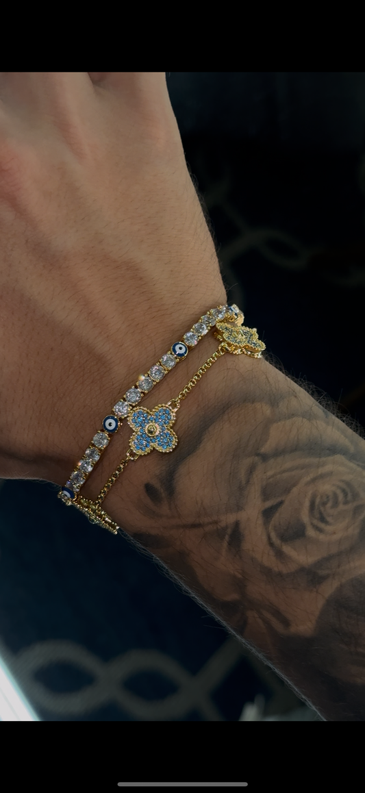 Combo en pareja * Brazalete tennis 4 mm ojo turco  y brazalete VC gold and Blue full iced out