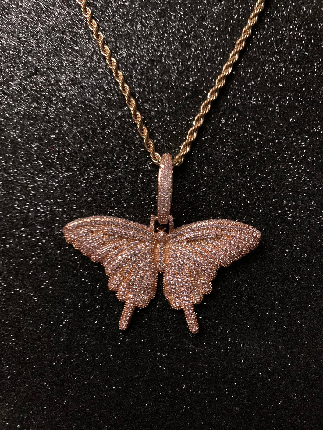 Dije de mariposa rose gold, laminado en oro rosa 18k (4 micras)